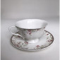Xicara em porcelana com pires decorativa